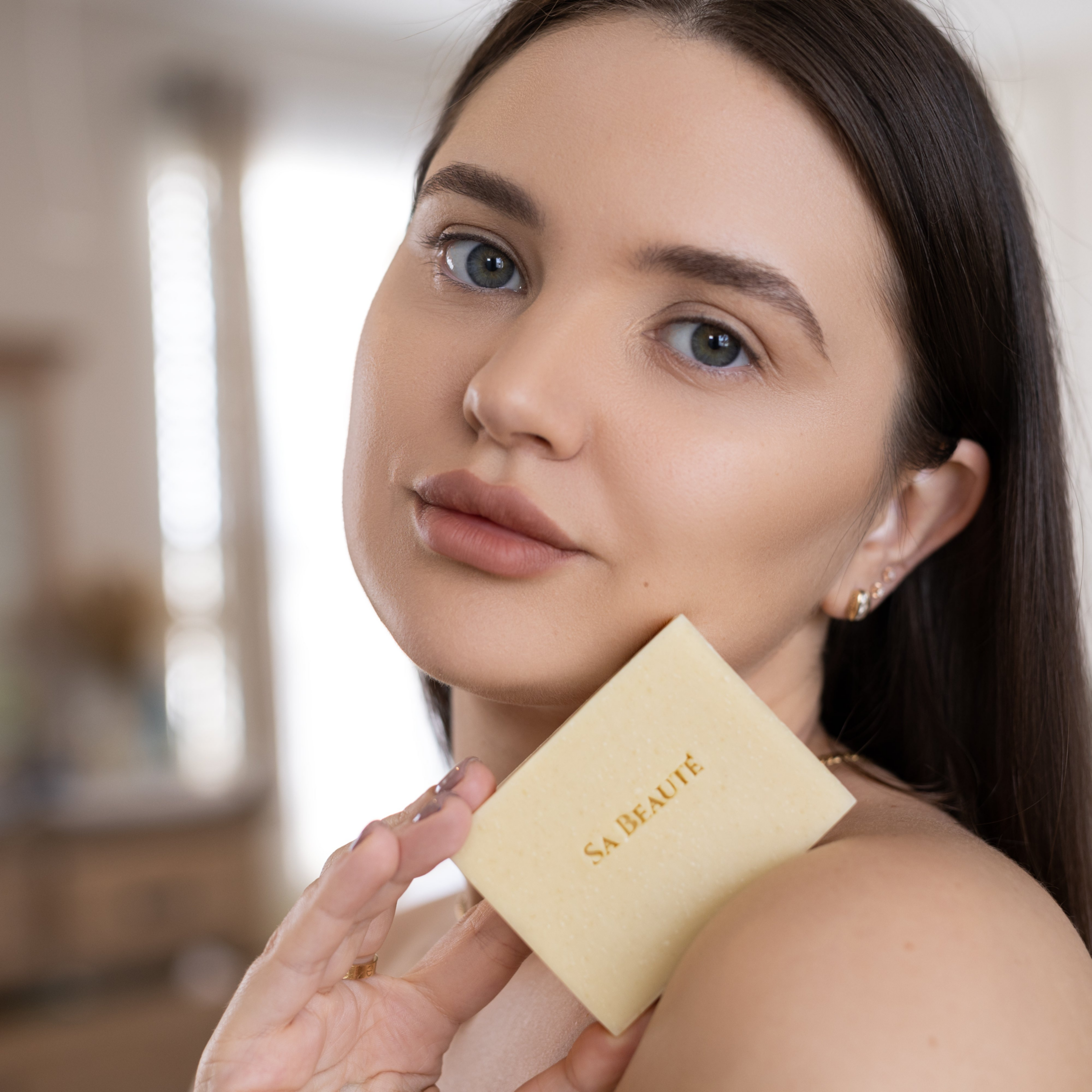 Girl using SA BEAUTE soap